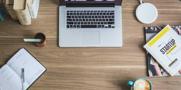 modern workspace with a laptop, coffee