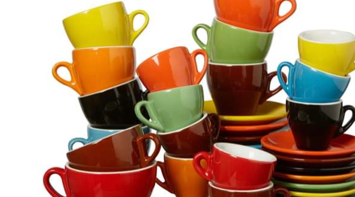 Stack of multi-coloured espresso cups from Espresso Canada