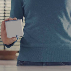Man Holding Saeco Philips AquaClean Filter in Hand