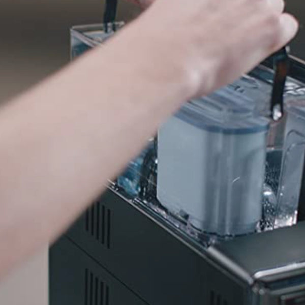 Saeco Philips AquaClean Filter Being Placed in Espresso Machine