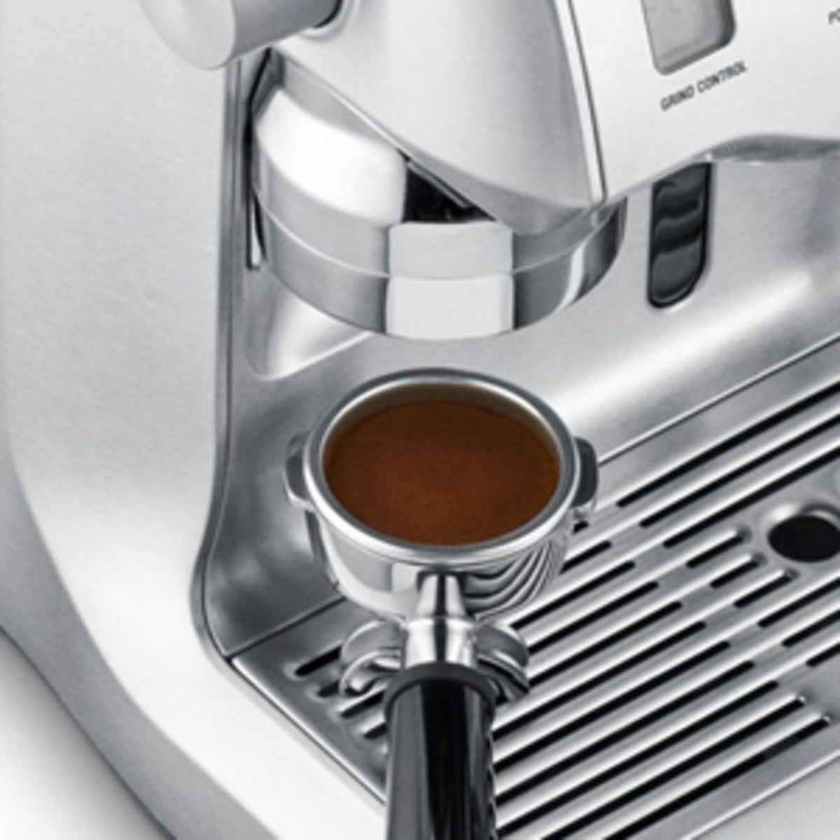 Breville Oracle BES980 Brushed Stainless Steel Close Up Portafilter  available from Espresso Canada